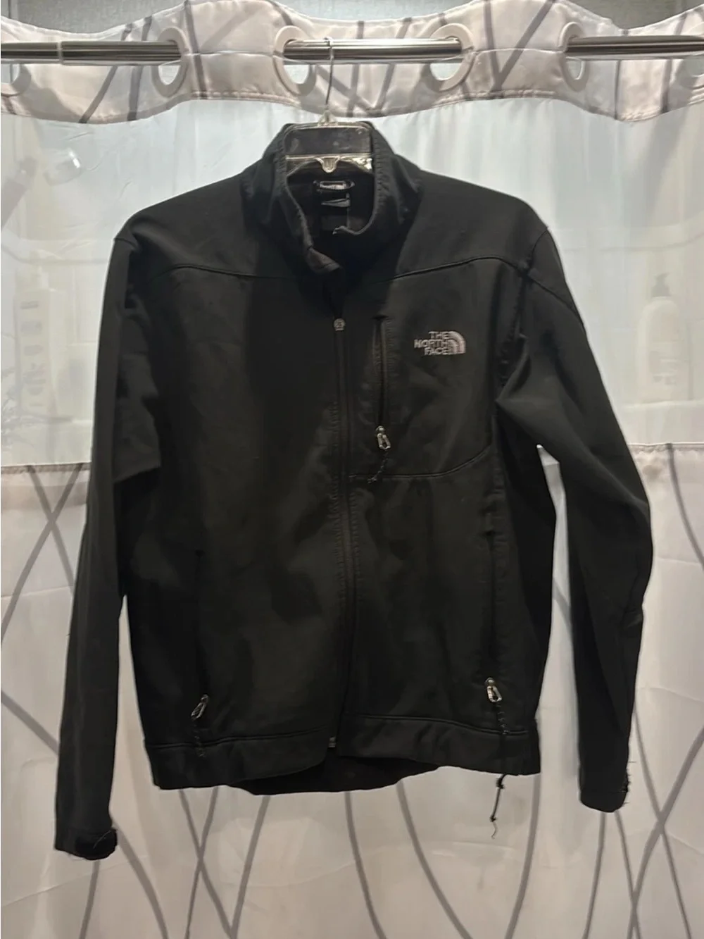 The North Face Black Softshell Jacket with Chest Zip Pocket and Embroidered Logo